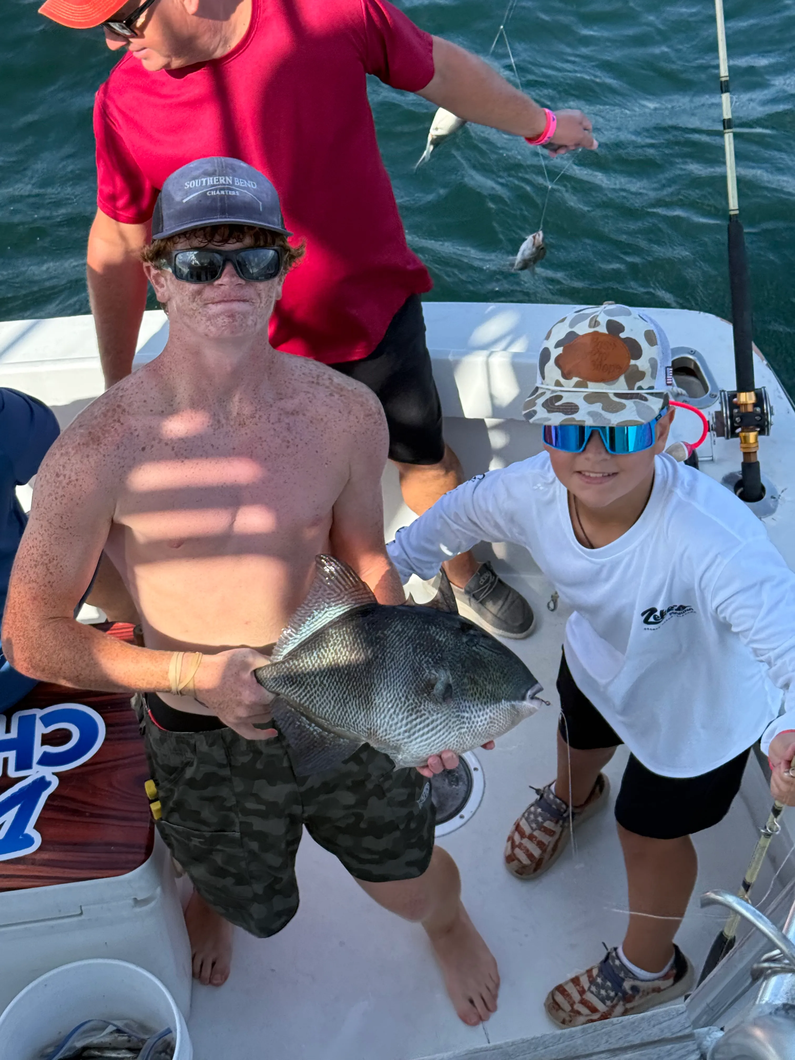Fishing charter guests with their catch Orange Beach Alabama